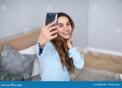 Woman Taking Selfies With A Smartphone Stock Image Image Of Looking