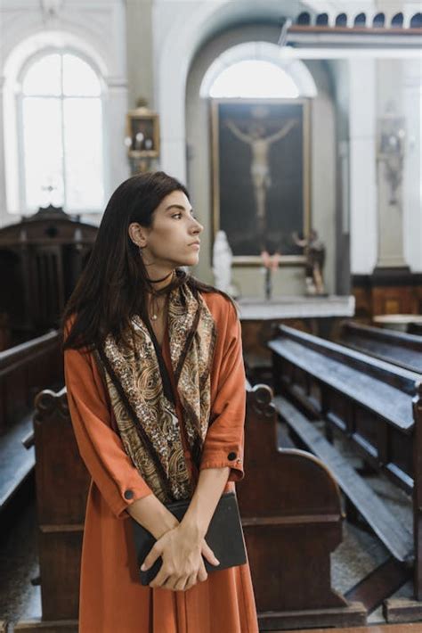 Brunette Woman Kneeling and Praying · Free Stock Photo