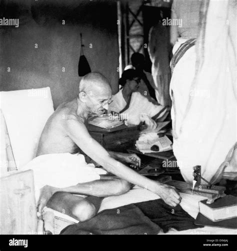 Mahatma Gandhi Spinning In His Hut At Sevagram Ashram Th August