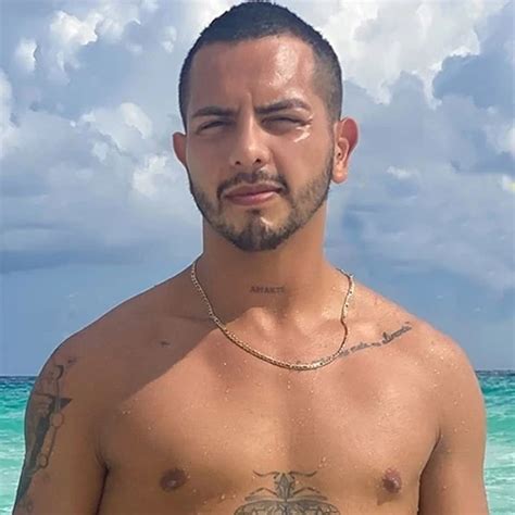 Antuan Is Enjoying The Blue Sea Under The Hot Cancun Sun While The