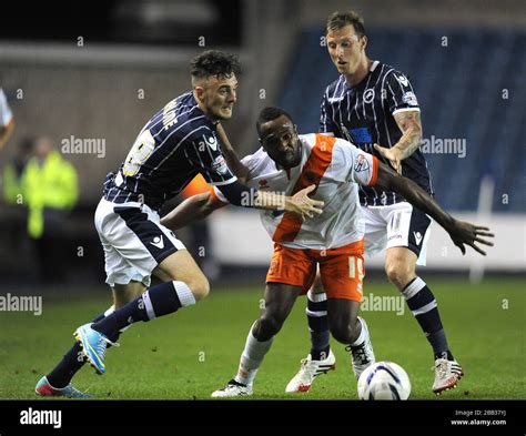 Millwall S Scott Malone Left And Martyn Woolford Right Challenge