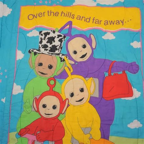 an image of children's blanket with cartoon characters on it