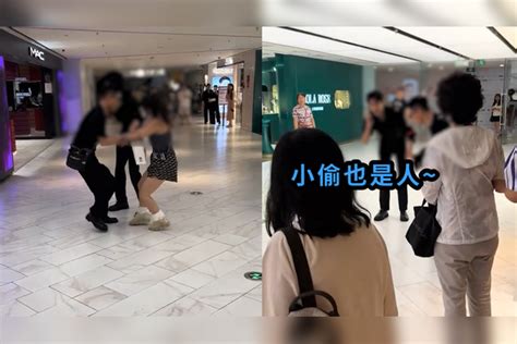 女子疑因偷化妆品被抓，不停试图挣扎逃脱，围观大妈竟共情称：小偷也是人