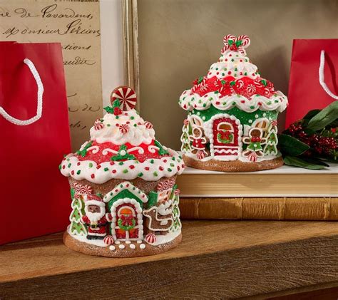 Two Christmas Gingerbread Houses On A Mantle