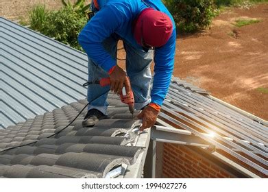 Roofer Work Installing Clay Roof Tilesconstruction Stock Photo ...