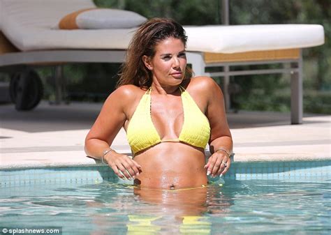 Rebekah Vardy Shows Off Her Toned And Bronzed Figure In A TINY Yellow