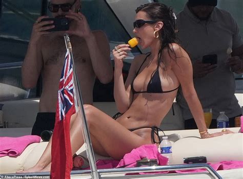 Bella Hadid Scintillates As She Strips Down To Tiny Black Thong Bikini