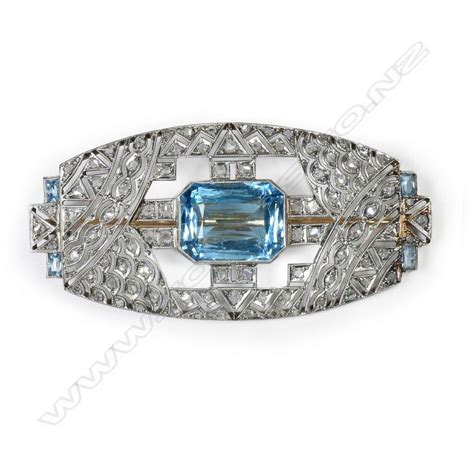 An Impressive Art Deco Platinum Aquamarine And Diamond Set Brooches