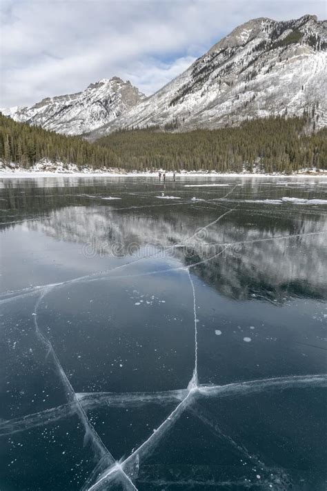 Cracked Ice on a Frozen Mountain Lake Stock Image - Image of snow, rockies: 267819147