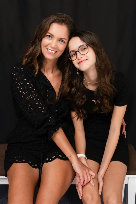 Mother and Daughter Posing Together · Free Stock Photo