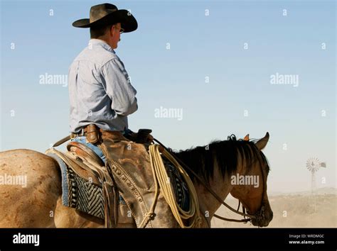 Cowboy on a West Texas ranch Stock Photo - Alamy