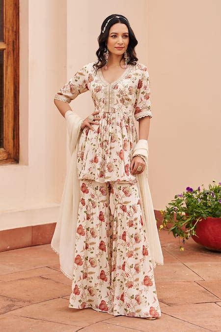 Buy Ivory Crepe Printed Floral V Neck Peplum Kurta Sharara Set For