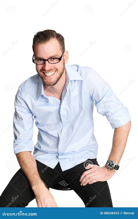 Man In Light Blue Shirt And Jeans Sitting Down Stock Image Image Of