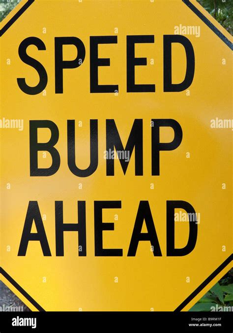 Speed Bump Ahead road sign Stock Photo - Alamy