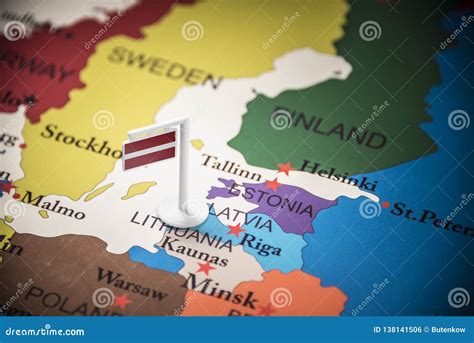 Latvia Marked with a Flag on the Map Stock Photo - Image of flagstaff ...