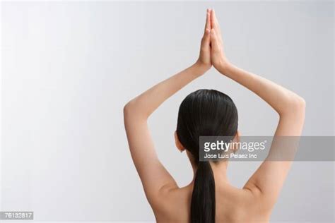 Stretching Hands Behind Head Rear View Photos And Premium High Res