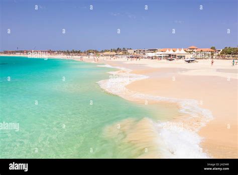 Waves breaking on the sandy beach in Santa Maria, Praia de Santa Maria, Baia de Santa Maria, Sal ...