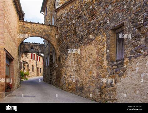 The historic arched entrance to the medieval village of San Lorenzo a ...