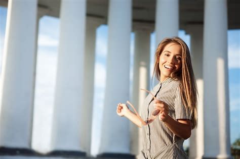 Free Photo Young Beautiful Cheerful Woman Walking Around City