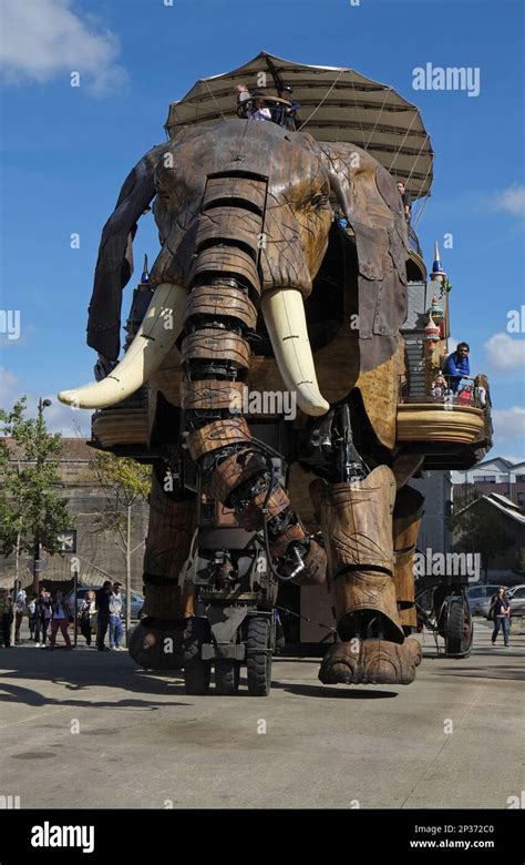 Tourists riding on gigantic mechanical elephant, The Great Elephant, Machines of the Isle of ...