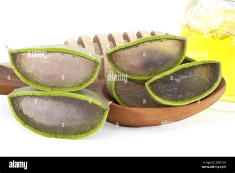 Aloe Vera Leaf Slices Showing The Inside Gel Of The Plant And Honey