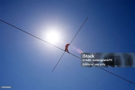 Walking A Tightrope Over The Grand Canyon Stock Photo - Download Image Now - Tightrope Walking ...