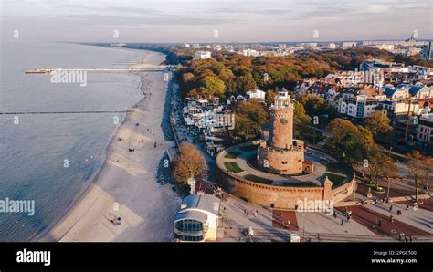 Port, lighthouse and pier in Kołobrzeg Stock Photo - Alamy