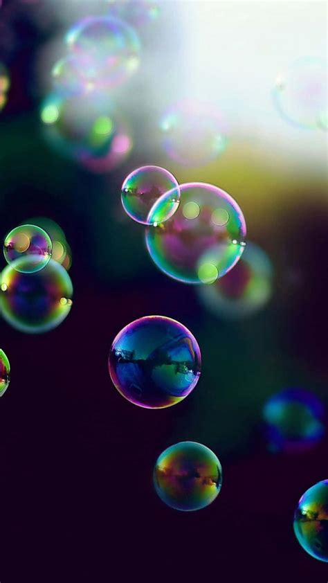 Download Soap Bubbles Floating In The Air Wallpaper