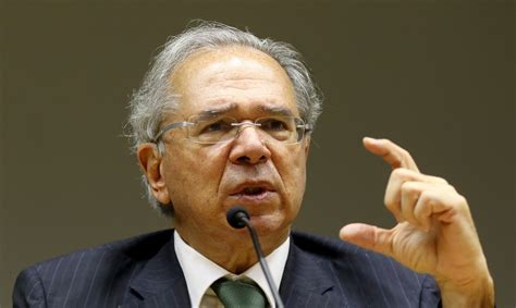 Paulo Guedes E A Praia De Bilh O De D Lares Esquerda Online