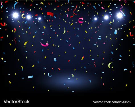 Colorful confetti on black background with spotlig