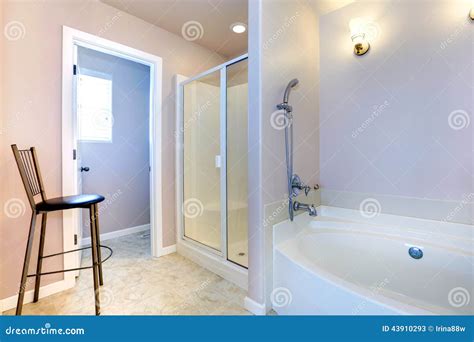 Refreshing Light Lavender Bathroom with White Bath Tub and Shower Stock ...