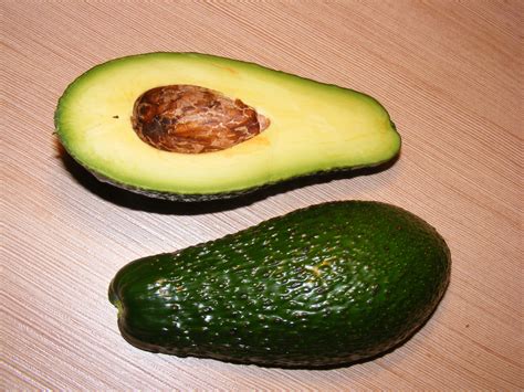 green exotic avocado fruit closeup  image
