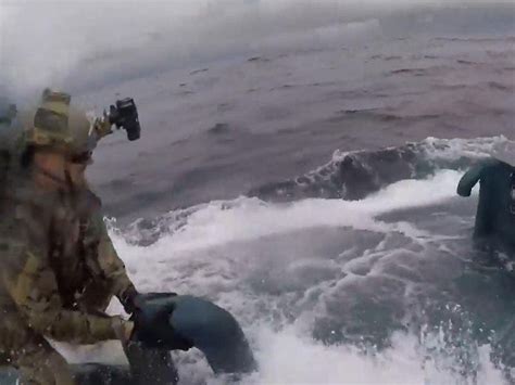 Watch Dramatic Video Shows Coast Guard Crew Leap On To Submarine In