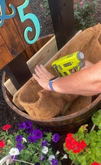 How To Fill A Whiskey Barrel With Flowers Level Up Barrel Planter Whiskey Barrel Planter