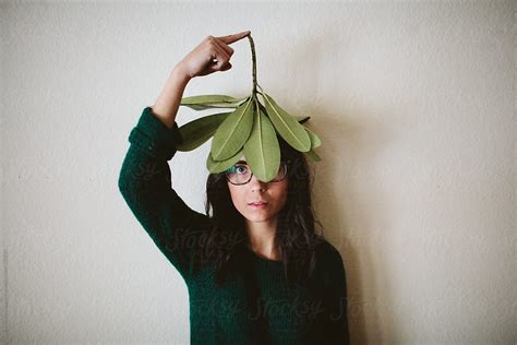 Girl With Leaves By Stocksy Contributor Luke Mallory Leasure