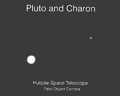 High Resolution HST Images of Pluto and Charon (ESO Press Release 09/94)