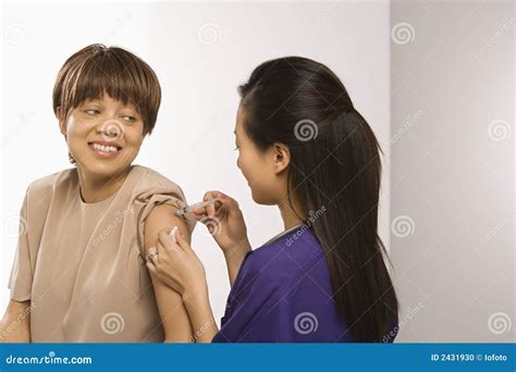 Patient Getting Shot Stock Photo Image Of Physicians 2431930