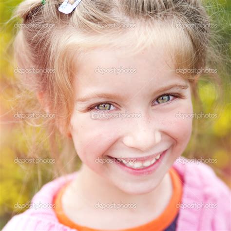 Portrait Of A Happy Little Cute Girl Stock Photo By ©tan4ikk 41975867