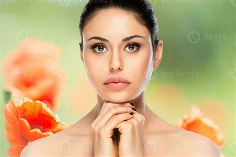 Beautiful Woman Face Portrait Over Flowered Blurred Background Beauty