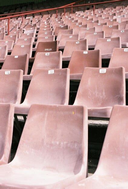 Premium Photo Low Angle View Of Chairs In Stadium