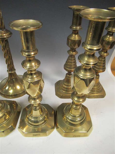 Three Pairs Of Brass Candlesticks To Commemorate Queen Victoria S