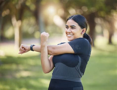 Fitness Nature And Happy Woman Stretching In An Outdoor Park For