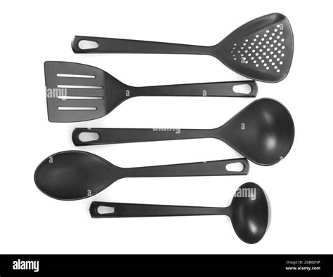 black kitchen utensils isolated on white Stock Photo - Alamy