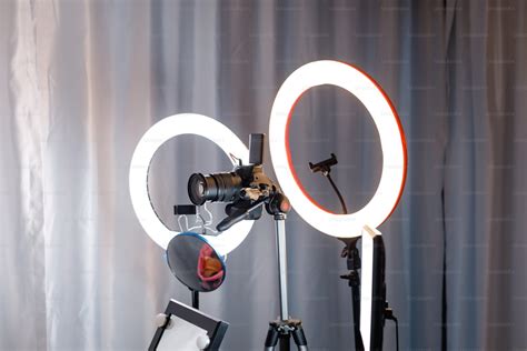 A camera and a light on a tripod photo – Social media Image on Unsplash