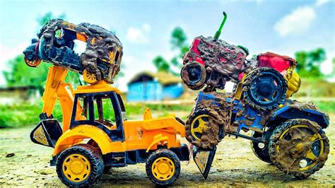 Sonalika Tractor Stuck In Deep Mud Pulling Out Farmtrac Tractor