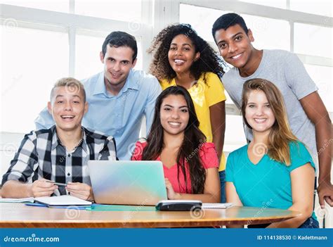 Laughing Teacher with Multicultural Group of Students Stock Photo ...