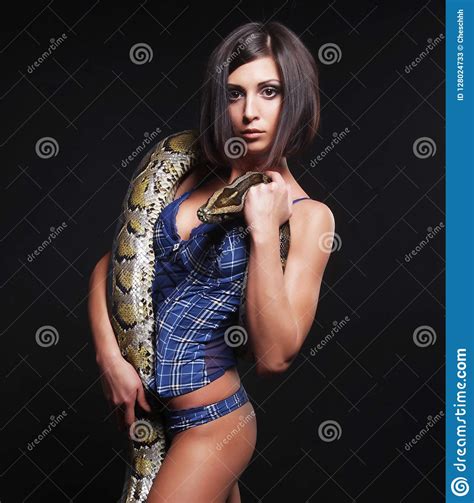 Brunette Holding Python Stock Image Image Of Golden