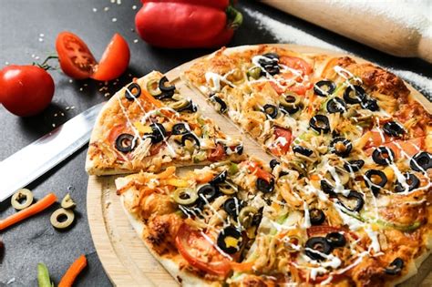 Free Photo Mix Pizza Olives Bell Pepper Cheese Mushrooms Top View