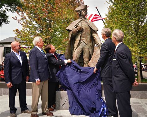 The John Hancock statue is unveiled by Quincy Mayor Thomas Koch and Gov ...