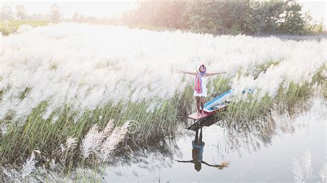 Portrait Of Beautiful Asian Woman Standing On Fishing Boat Enj Stock